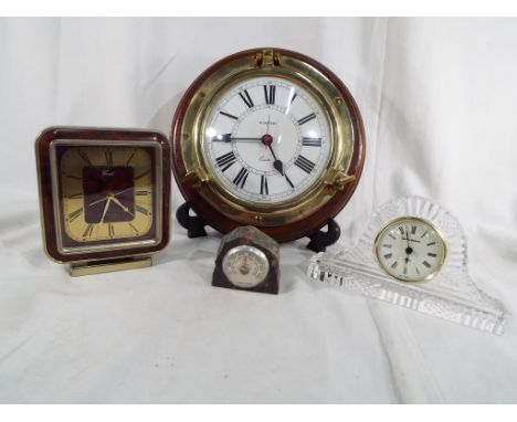 Two mantle clocks together with one wall clock and a thermometer (4)