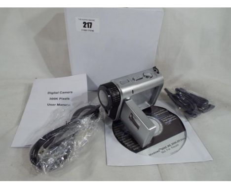 An unused digital 300k pixel camera with disc, lead and manual, boxed. Estimate £10 - £20