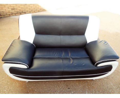 A two tone black and white two seater sofa with chrome legs,  96 cm x 160 cm x 82 cm, Est £30 - £50