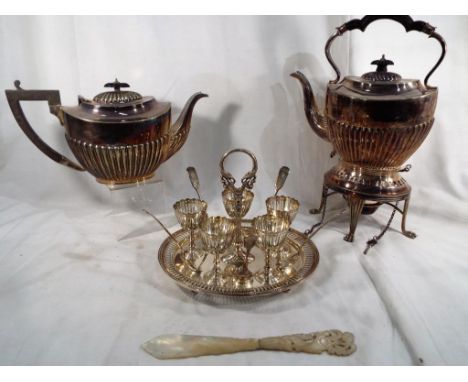 A good mixed lot to include silver plated teapot and matching kettle with burner, a silver plated egg cup set and a mother of