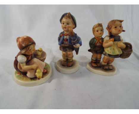 Goebel / Hummel - three figurines - Est £40 - £50