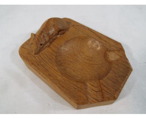 Robert 'Mouseman' Thompson - an oak ash tray of rectangular form, canted to one end and signature carved with a mouse, 10 cm 