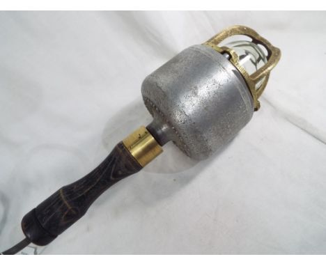 A brass and steel safety inspection lamp No. 7344/6. Estimate £30 - £50