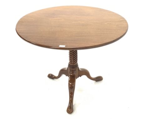 Georgian mahogany tripod table, the circular single plank tilt top on spiral turned column, three out splayed supports and br