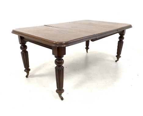 Victorian mahogany wind out extending dining table, rectangular moulded top over turned reeded tapered supports terminating i