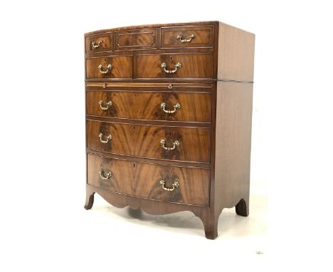 20th century mahogany bow front chest, the cross banded top with ebonised stringing over one long and two short drawers, brus