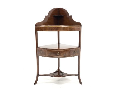 Georgian mahogany bow front wash stand, raised shaped back with open shelf over fitted panel covering washbowl recesses, one 