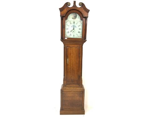 George III and later oak longcase clock, swan neck pediment with applied hammered brass roundels over plain turned pilasters,