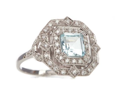 AQUAMARINE AND DIAMOND RING,the step cut aquamarine within a double halo of diamonds totalling approximately 0.58 carats, mar