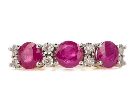 RUBY AND DIAMOND RING,set with round rubies interspaced by pairs of illusion set diamonds, marked 375, size M, 2.7g