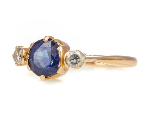 SAPPHIRE AND DIAMOND RING,the cushion cut sapphire flanked by round brilliant cut diamonds totalling approximately 0.10 carat