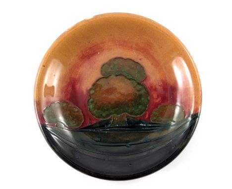 William Moorcroft, an Eventide plate, circa 1928, circular with everted rim, impressed marks and underglaze blue monogram, 22