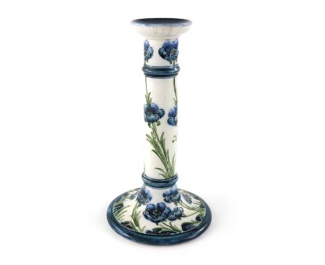 William Moorcroft for James MacIntyre, a blue Poppy on white candlestick, circa 1903, Tuscan column form, printed Florian mar