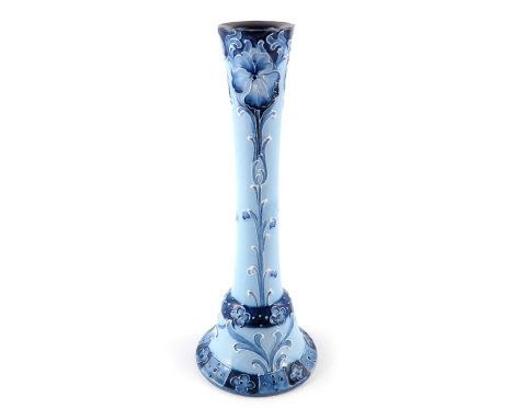 William Moorcroft for James MacIntyre, a Florian Ware Forget Me Not candlestick, circa 1900, inverted bell form with slender 