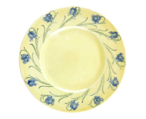 William Moorcroft for Liberty and Co., a Bluebell border plate, circa 1904, yellow ground, printed marks and underglaze green