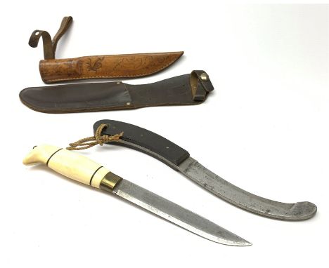 Norwegian hunting knife with 15cm steel single edged blade, bone handle and brass ferrule, in leather scabbard decorated with