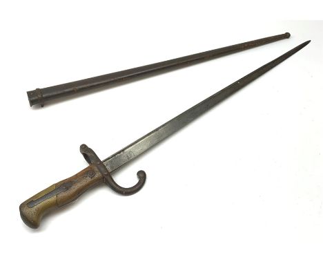 French Model 1874 Epee bayonet the 52cm steel blade inscribed 'Mre. d'Armes de St. Etienne Janvier 1880', in steel scabbard L