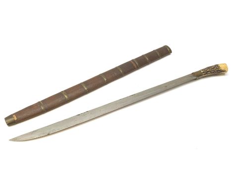 Continental hunting knife in the Khyber style with 49cm single edged steel blade and brass mounted stag antler grip, in brass