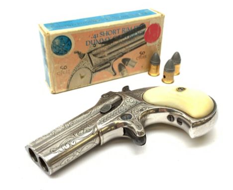 Factory engraved Remington .41 calibre double barrel over and under Derringer, the top of the barrels inscribed 'E. Remington