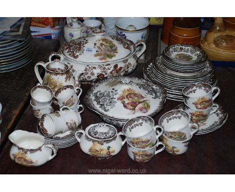 A Royal Worcester Pallisy 'Game Bird' series part Dinner Service comprising five dinner plates, six each teacups, side plates