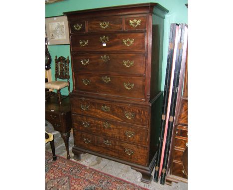 A Georgian Mahogany Chest on Chest, the top section having three short over three long graduated drawers, the base having bru