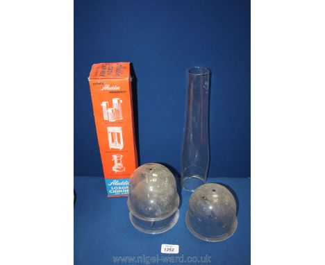 A box of five vintage oil or gas lamp glass globes and chimneys