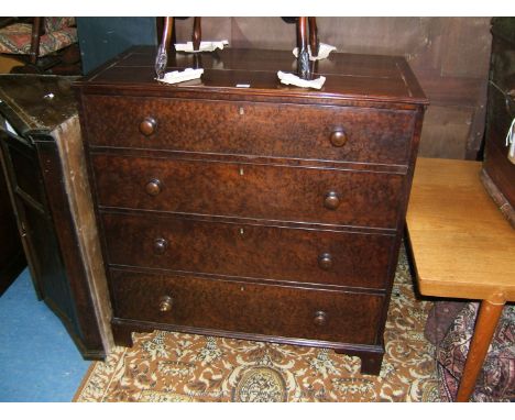 A Victorian style Oak Chest of two short over three long graduated Drawers with wooden knobs and standing on bracket feet. 43