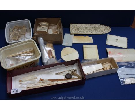 A quantity of  vintage carved bone or ivory pieces including a model of ox cart. cribbage board, fan, miniature house, etc (s