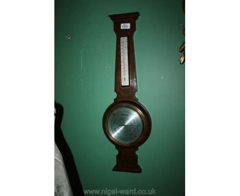 A wooden framed Barometer 'Comitti London'