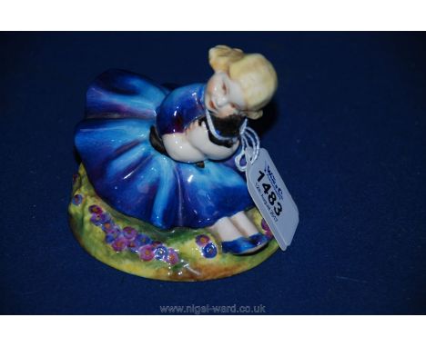 A Royal Worcester figure 'Pansy' modelled by Anne Acheson, of a little girl sitting holding a kitten
