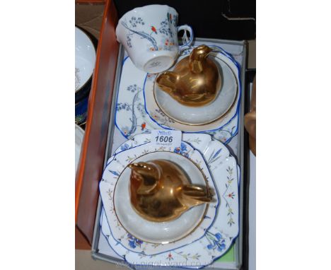 A Foley trio, three Shelley tea Plates and saucer with two Royal Worcester Hen and Cockerel gilt Egg Cups and covers