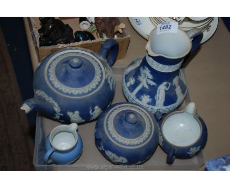 Miscellaneous Wedgwood blue and white Jasperware including teapot, two jugs, sucrier and a tall jug, mostly a/f