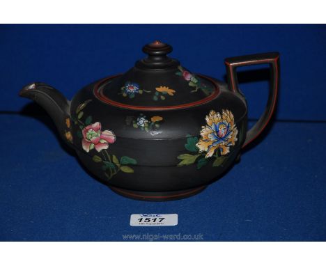 A fine 19th century Wedgwood Capri ware teapot, black basalt enameled with Chinese flowers, impressed marks.