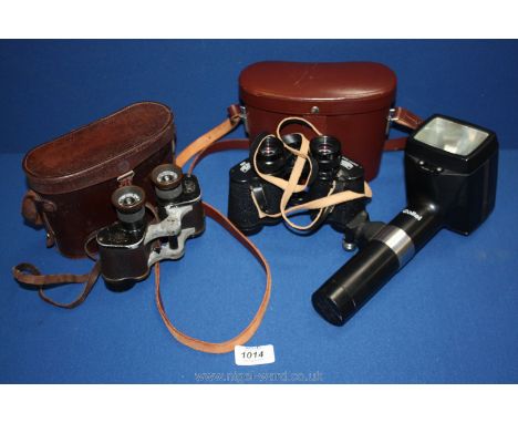 A pair of Carl Zeiss Deltrintem 8 x 30 multi-coated Binoculars with case, Rollei plus flash gun and a vintage pair of Carl Ze