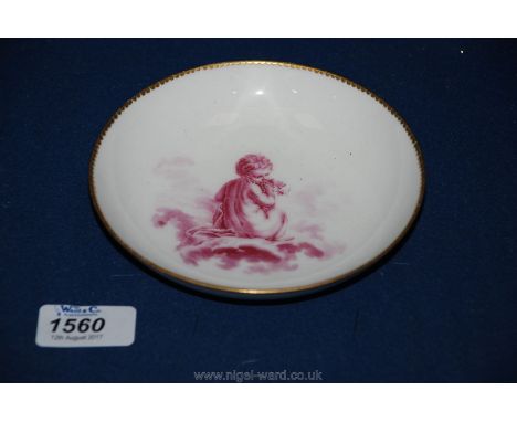 A very rare Vincennes Saucer exquisitely painted in puce with a cherub among clouds, date code A between double Ls for 1752-3