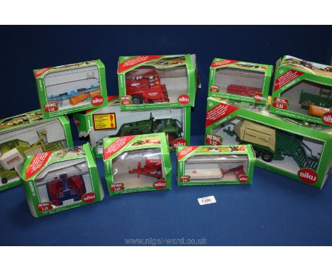 A quantity of Siku model toy tractor implements,1:32 gauge, boxed and including Claas Rollant 255, Fendt tractor with hay bai