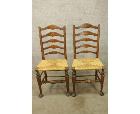 A pair of 19th century beech Lancashire ladder back dining chairs. 