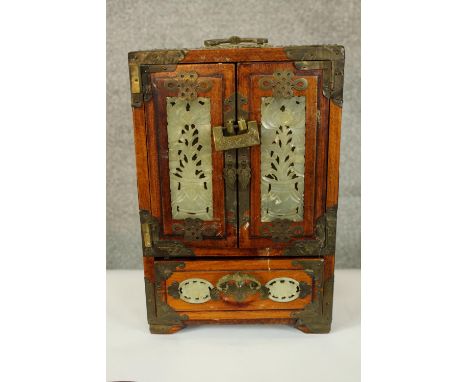 A small decorative Chinese jewellery cabinet with jade inlays. Complete with its lock and key. Early twentieth century. H.28 