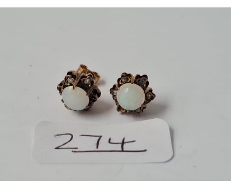 A pair of gold opal &amp; diamond earrings set in gold - 3.8gms