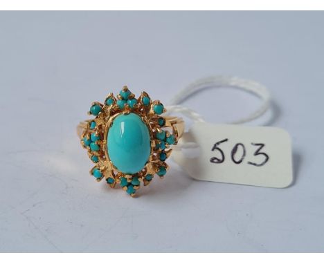 AN ATTRACTIVE TURQUOISE RING IN 18CT GOLD - size P - 6.2gms