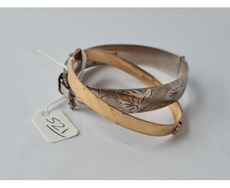 A silver bangle &amp; a rolled gold bangle