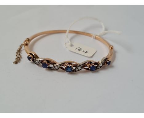 A VICTORIAN GOLD BANGLE SET WITH SAPPHIRES &amp; DIAMONDS IN A TWIST DESIGN