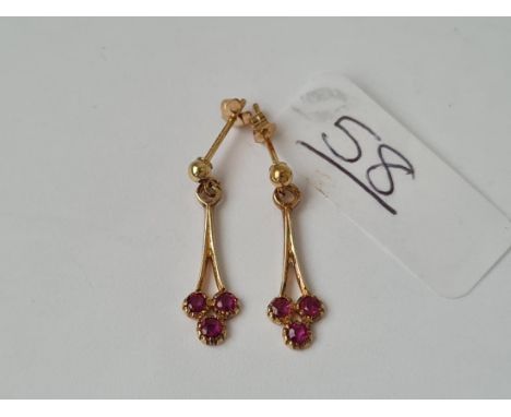 A pair of ruby? earrings in 9ct