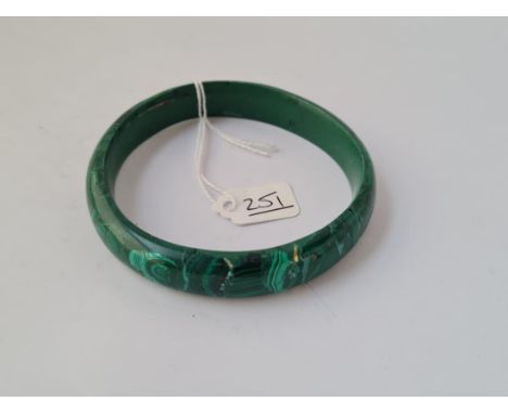 A circular malachite bangle