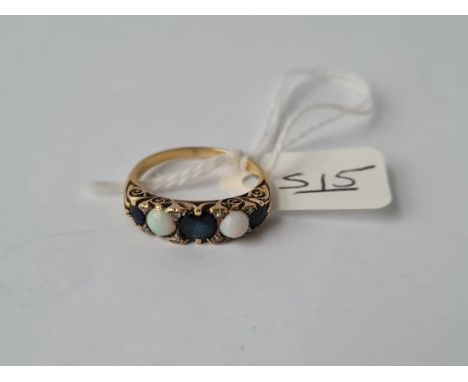 A sapphire &amp; diamond ring in 18ct gold - size L - 4.1gms