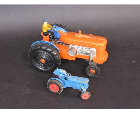 Played with Crescent Toys, diecast tractor together with a Marx Toys battery operated tractor 