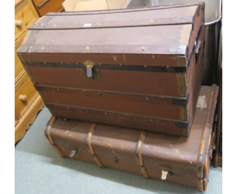 A wood bound travel trunk and a domed trunk (def) (2) Condition Report: Available upon request