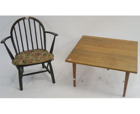A Mid Century teak coffee table 38cm high x 70 cm wide x 70cm deep and a small Ercol chair (2) Condition Report: Available up