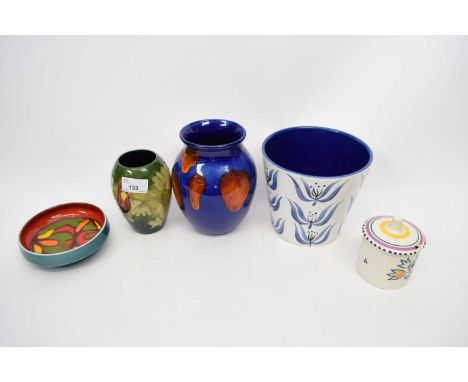 Group of Studio pottery wares including Poole vases and Moorcroft vase with tube lined flowers on green ground