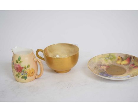 A Royal Worcester cup and saucer painted with fruit and signed by Ricketts together with a small blush ground Worcester jug (